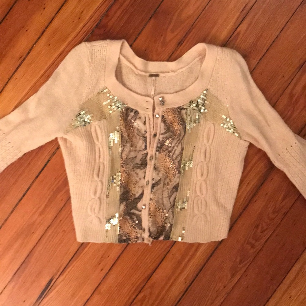 pink cardigan with sequins and stud buttons